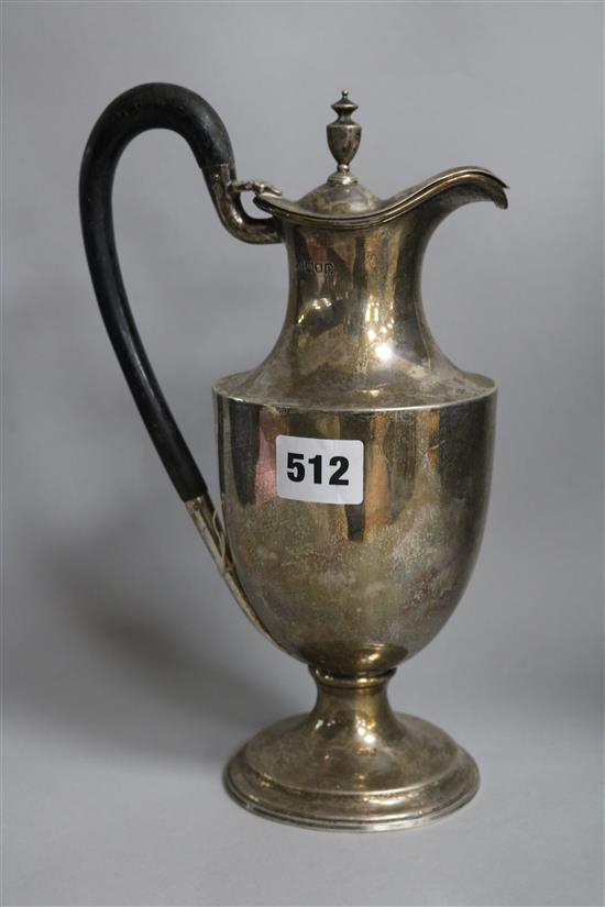 A late Victorian silver hot water pot, London 1900, gross 16ozs.